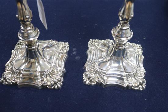 A pair of 18th century style silver candlesticks, by A. Taite & Sons Ltd, London, 1960, 20.8 oz.